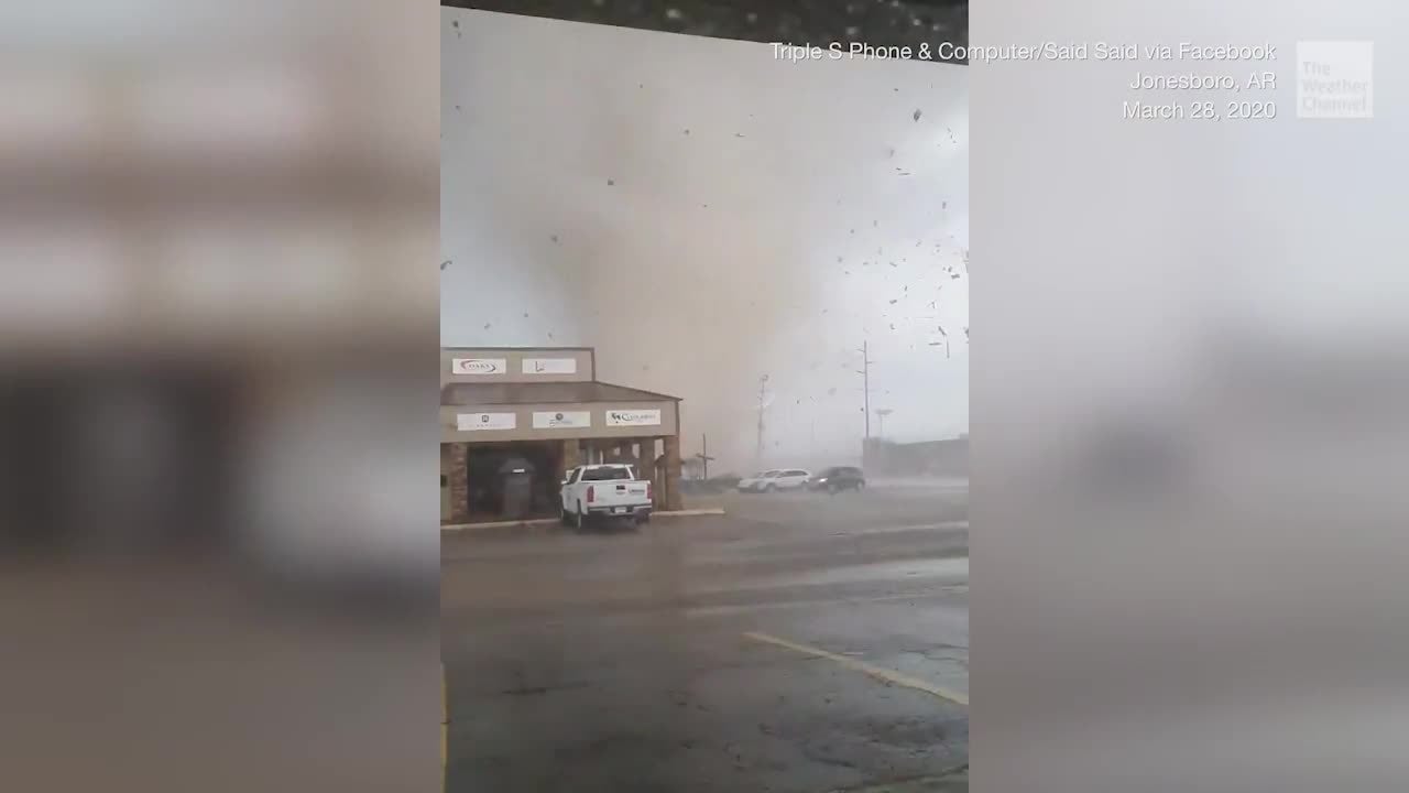 Watch Tornado Sends Debris Flying, Sparks Power Lines Videos from