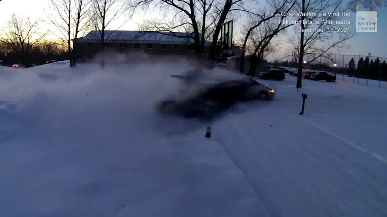 Airborne Snowmobile Demolishes Garage Door Videos from The Weather Channel