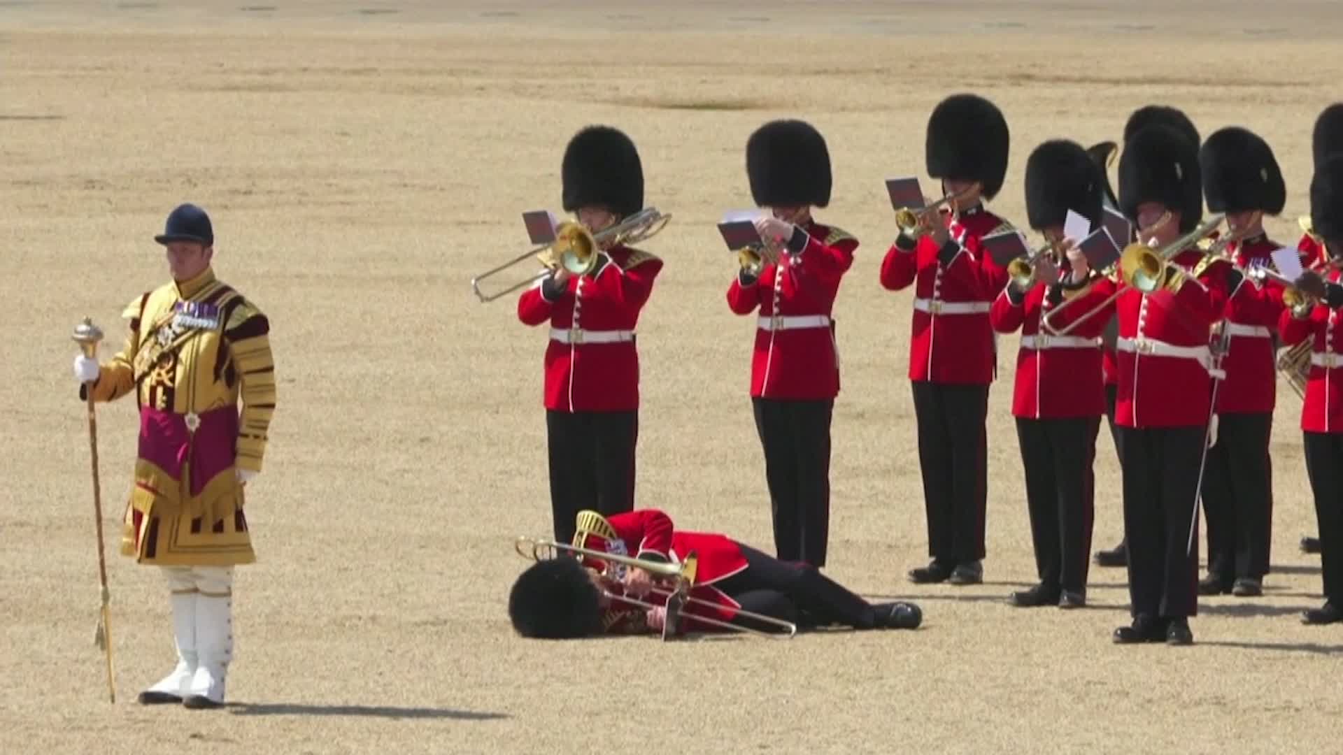 British Royal Guards Collapse During Hot Rehearsal Videos from The