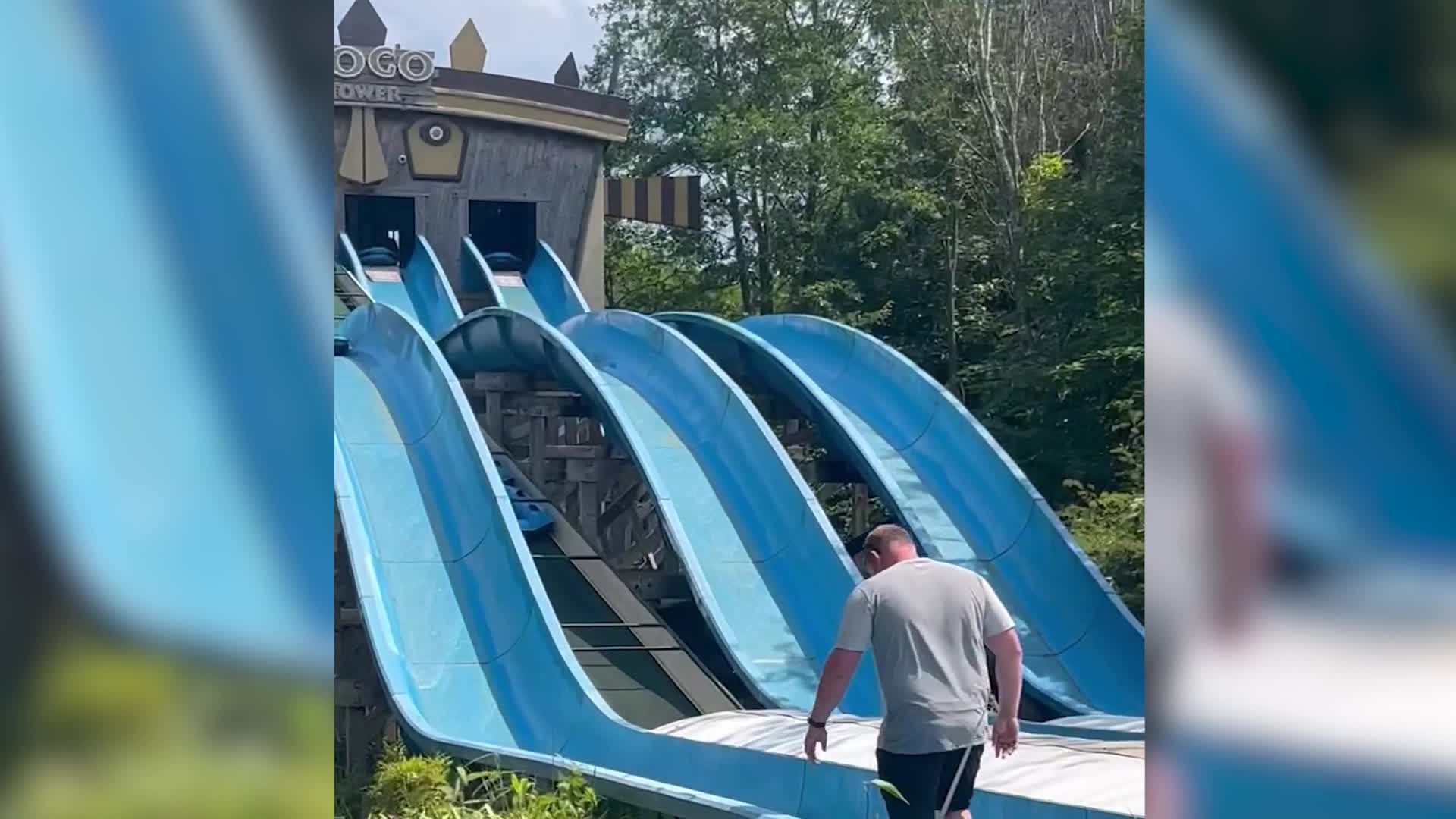 Dad Scales Waterslide After Daughter Gets Stuck Videos from The