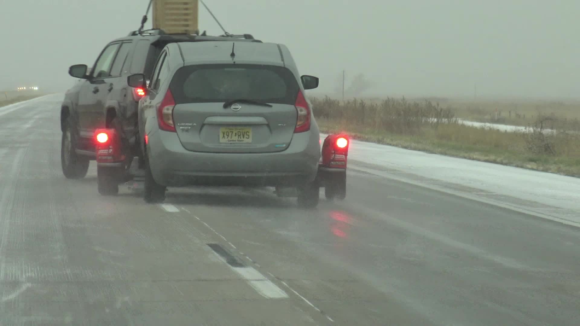 Car Slips Off Of Snowy Road Videos from The Weather Channel