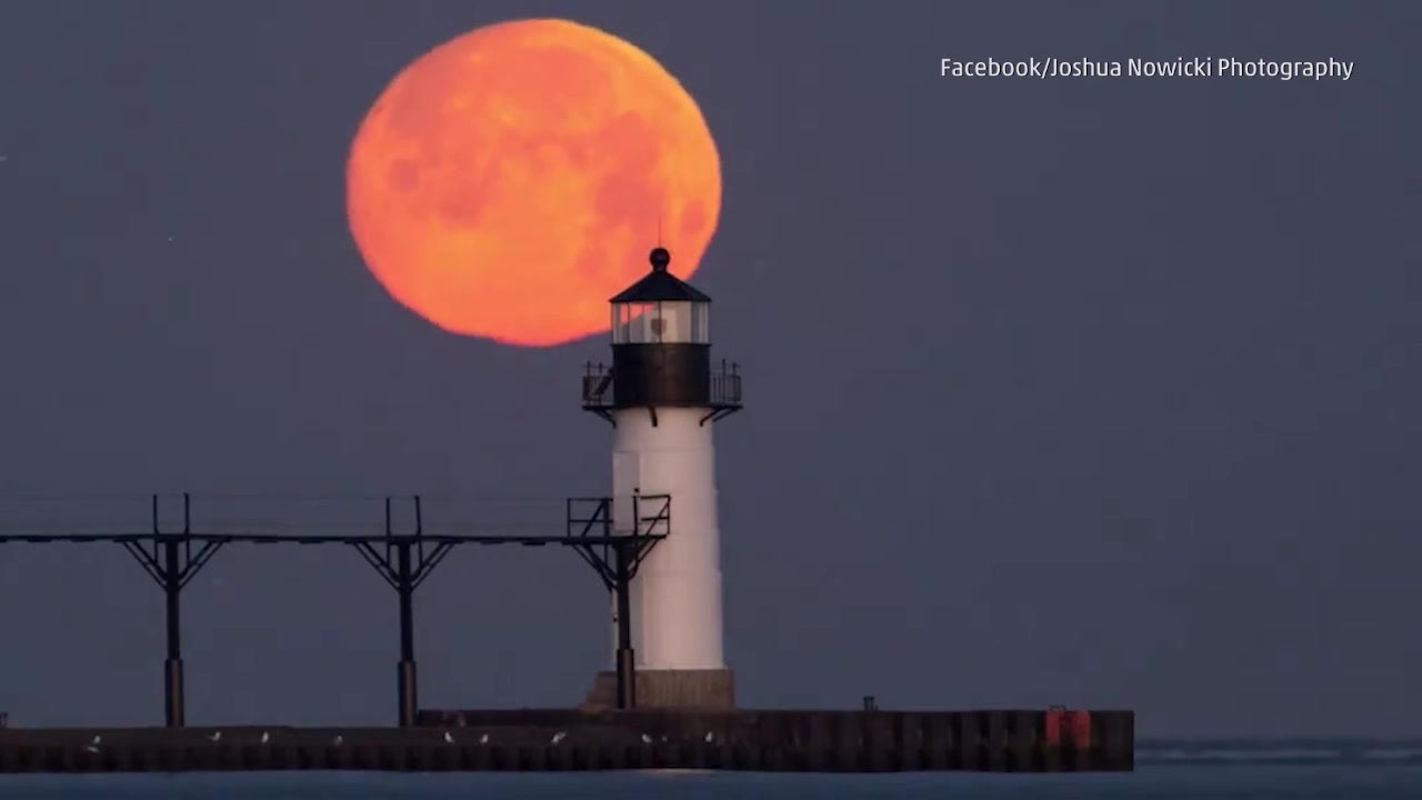 Dramatic golden moon sets at Michigan Videos from The Weather Channel