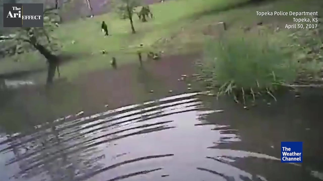 Watch Officer Jump into Pond to Save Boy | The Weather Channel