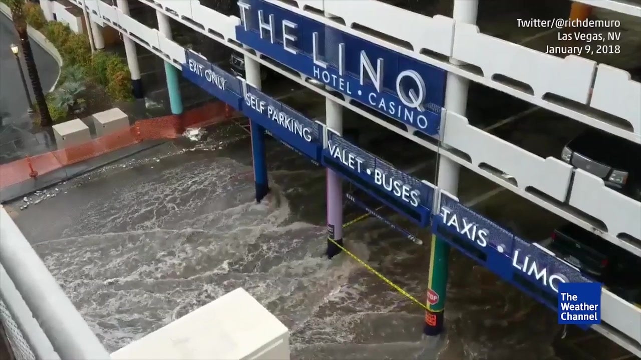 Floodwaters Surge Through Vegas Parking Garage - Videos from The