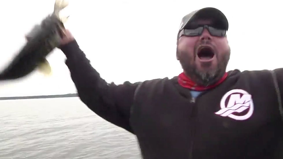 Angler Snags Bass with Fish In Its Mouth