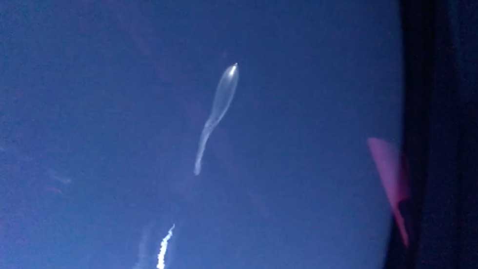 SpaceX Rocket Launch Seen From Airplane Window